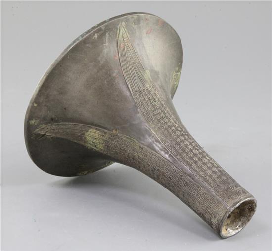 The upper fragment of a Chinese archaic bronze ritual wine vessel, Gu, Shang dynasty, 14th-12th century B.C., 10.5 cm high